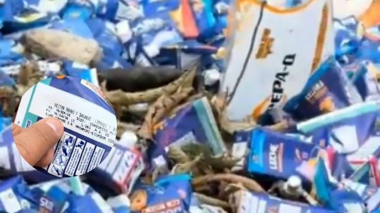 Miles de raciones de desayuno escolar botadas a orillas de un río, en Ventanas